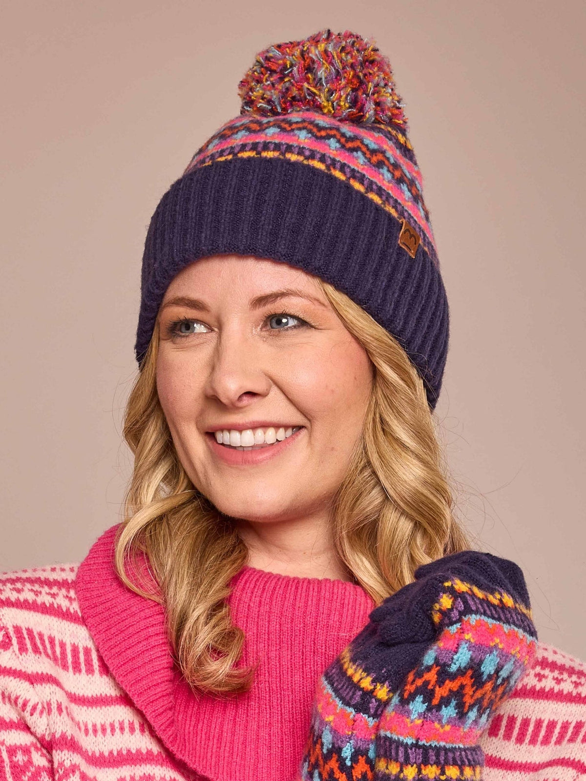 Blue knitted patterned bobble hat - DUNNOCK HAT INDIGO MULTI
