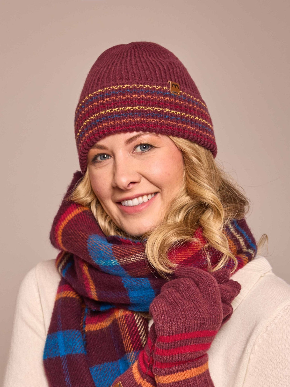 Red ladies' stripy knitted beanie hat - CHAFFINCH HAT ZINFANDEL RED MULTI
